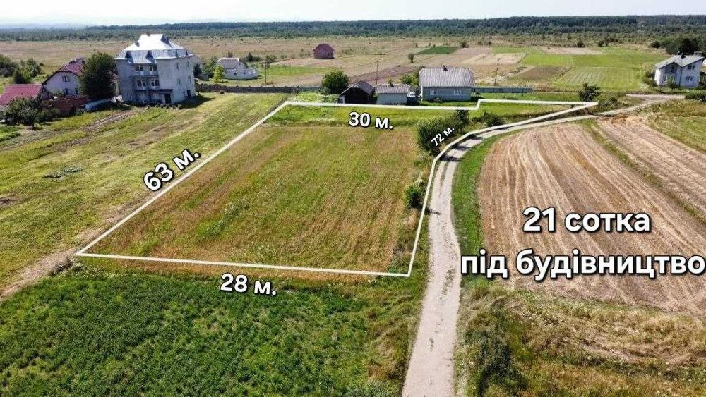 Продаж земельної ділянки 21 сотка Братківці під будівництво, світло, асфальт, будинки