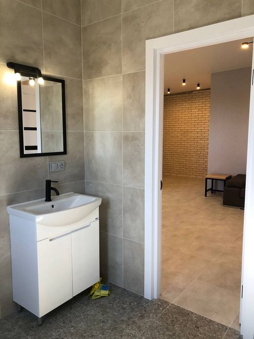 Продаётся новый дом в Обуховке в закрытом охраняемом городке с ремонто