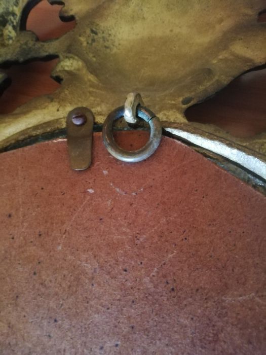 Moldura em bronze