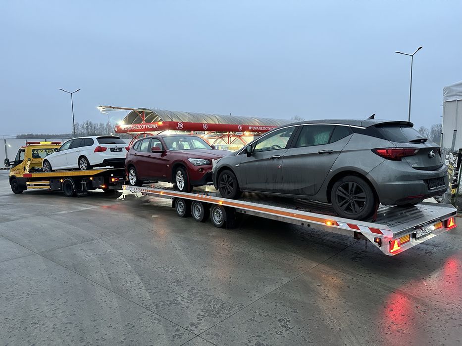 Pomoc drogowa holowanie transport maszyn przyczepa laweta autolaweta