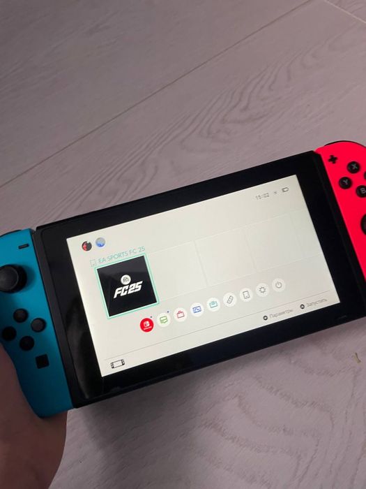 Портативна ігрова приставка Nintendo Switch with Neon Blue and Neon Red Joy-Con (045496452629)