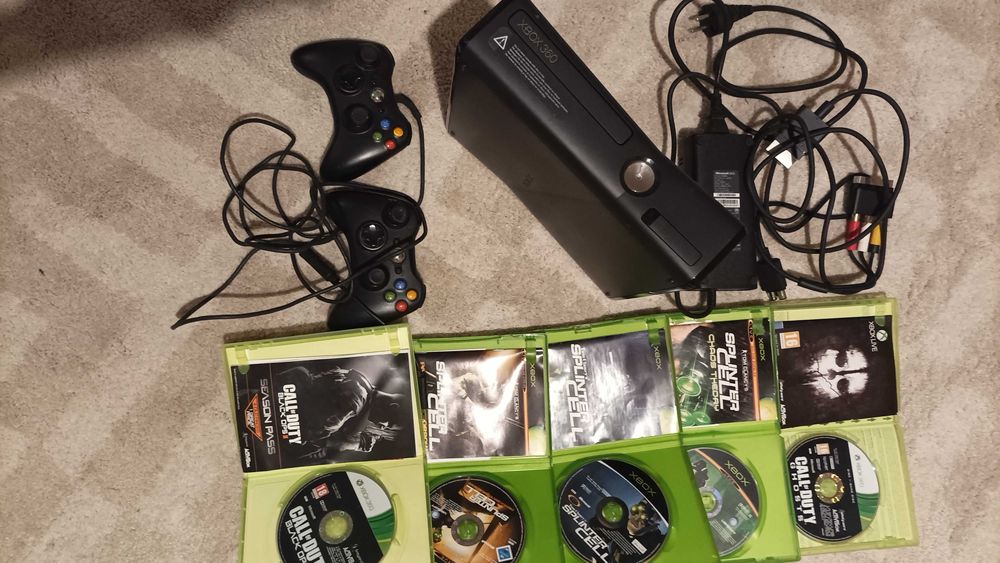 Xbox 360 with controllers, cables, and games64751976569089120