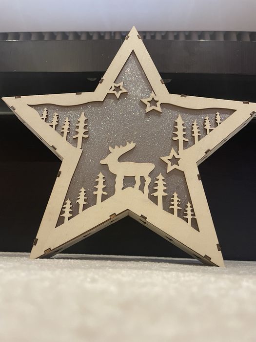 Estrela de Natal em madeira com luz