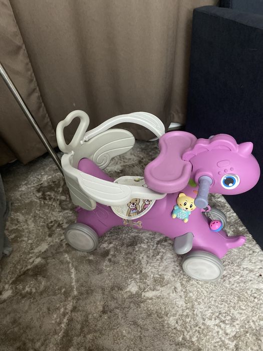 Коник-каталка на колесах