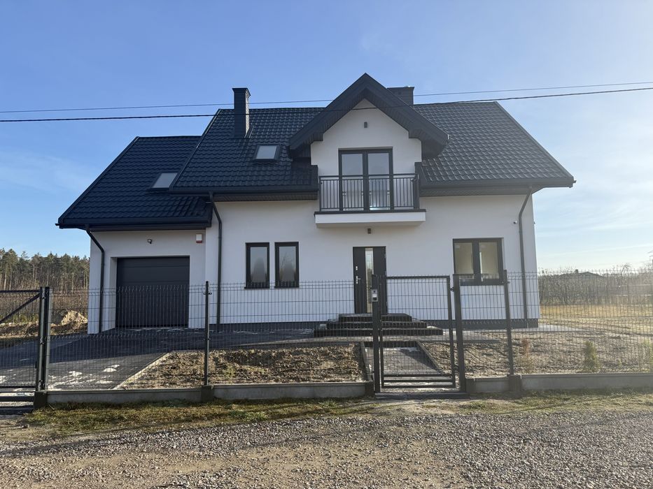 Piękny  dom w otulinie lasów