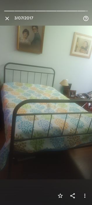 Vendo cama de ferro antiga restaurada com rodas