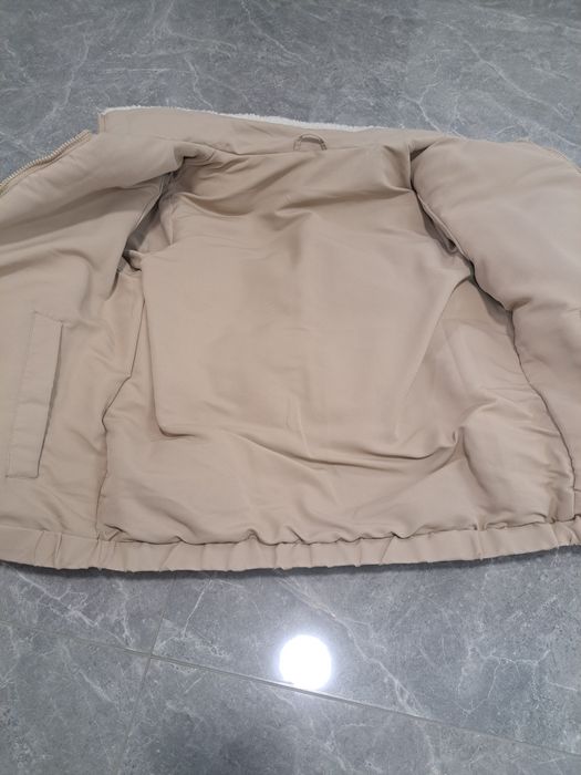 Куртка двохстороння.