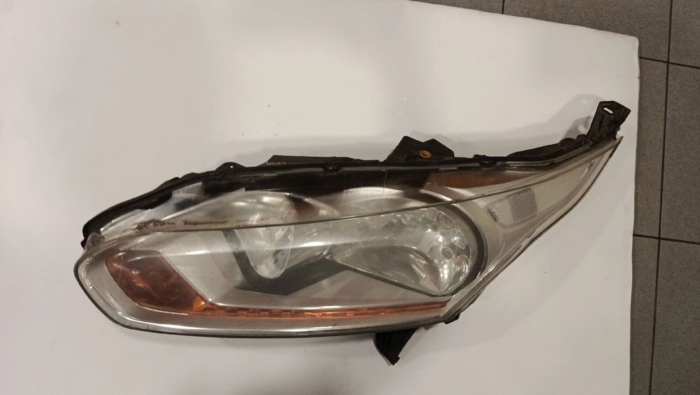 Ótica / farol esquerda FORD Transit Connect II (V408)