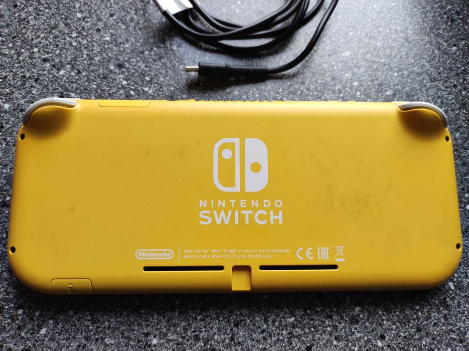 Nintendo Switch lite żółty sprawny