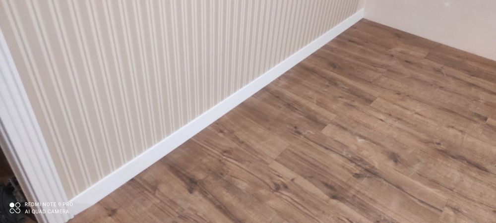 Укладка ламінату Монтаж плінтуса Укладання ламінату Плінтус Мдф