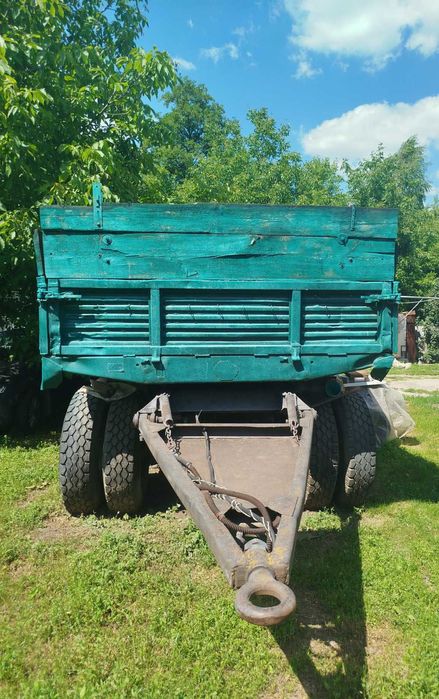 Камаз колхозник( на бока) і 2 прицепа