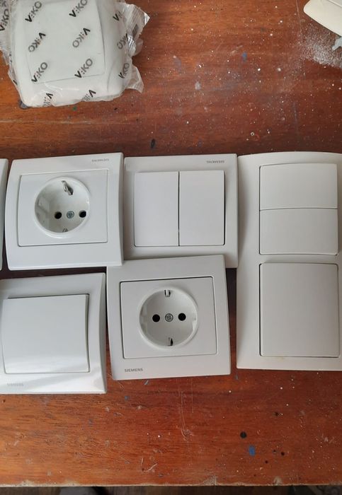 Вимикачі та розетки Siemens
