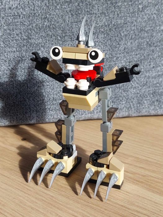 Klocki LEGO Mixels Seria 3, Spikels
w tym Footi, ​​Scorpi, Hoogi i N