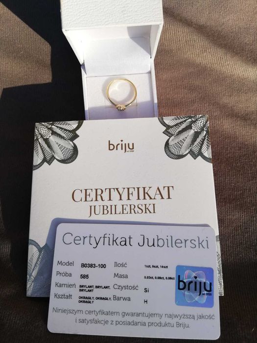 Złoty pierścionek z brylantem od Briju.