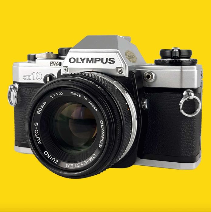Olympus OM-10 + Olympus Zuiko 50mm f/1.8 - (testada e limpa)