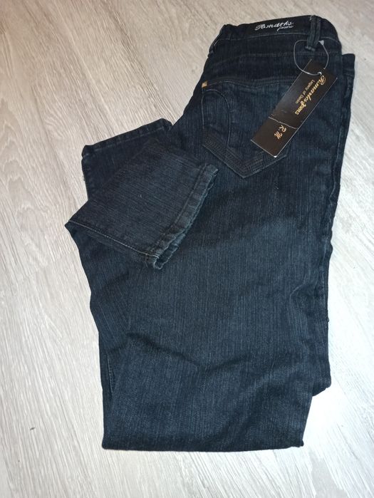 Nowe czarne jeansy z metką