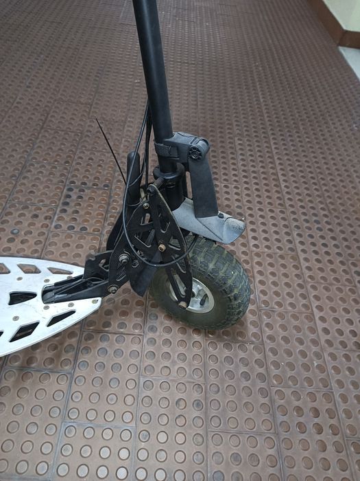 Trotinete a gasolina motor a cima dos 65cc