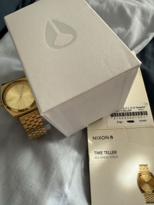 Relogio nixon dourado