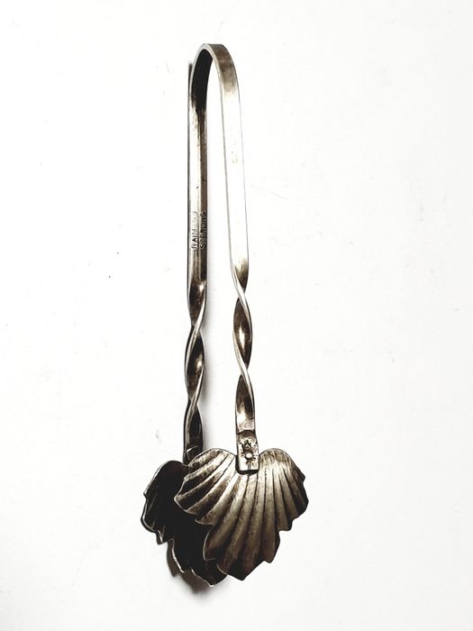 Antiga pinça para açúcar em pedra em prata contrastada