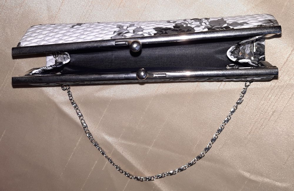 Carteiras novas clutch