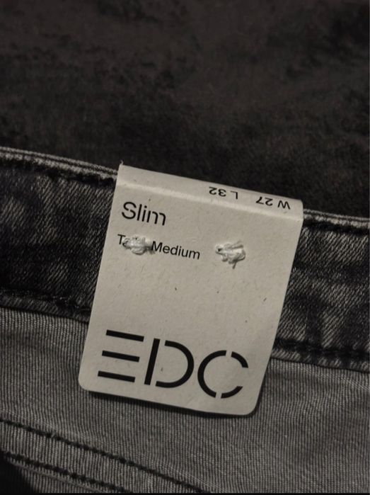 nowe szare jeansy z metką