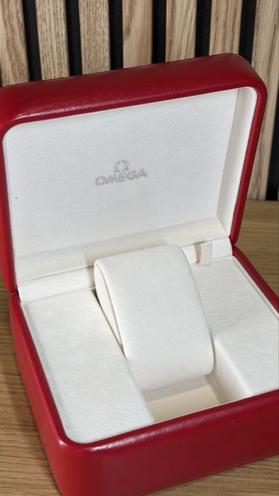 Omega caixa como nova