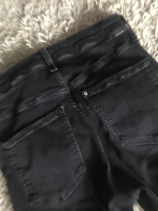 Jeansy  damskie, czarne z rozdarciami r. M z H&M