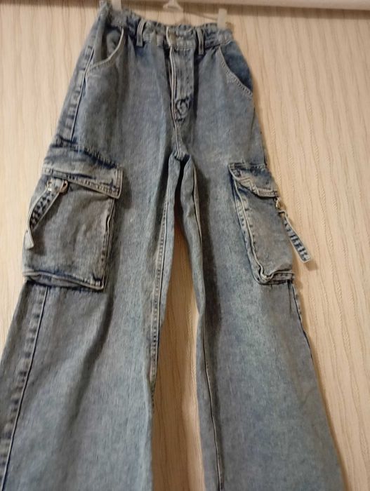 Жіночі широкі джинси