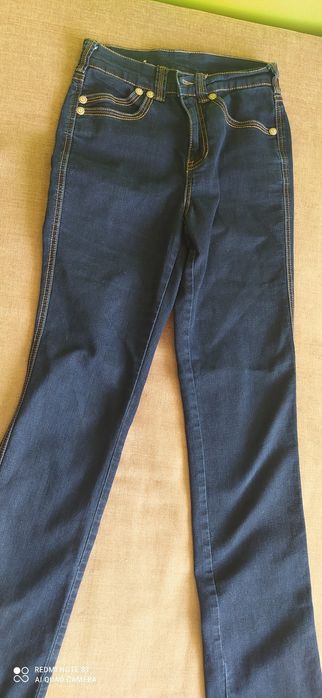 Granatowe jeansowe spodnie dziewczęce 36 KappAhl
