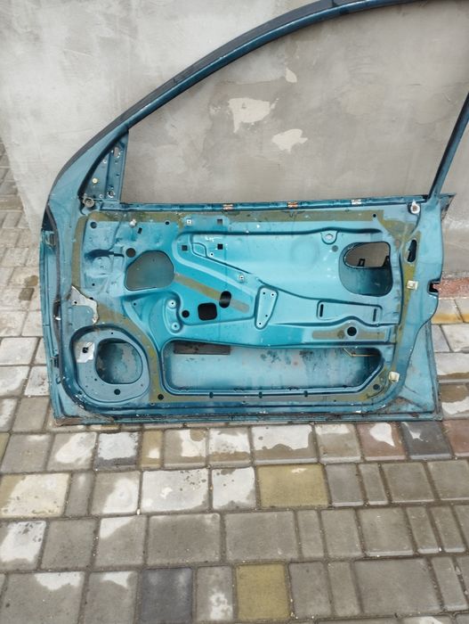Двері праві Опель омега В