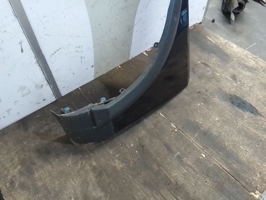 Guarda-lamas esquerdo LAND ROVER Discovery III (L319)