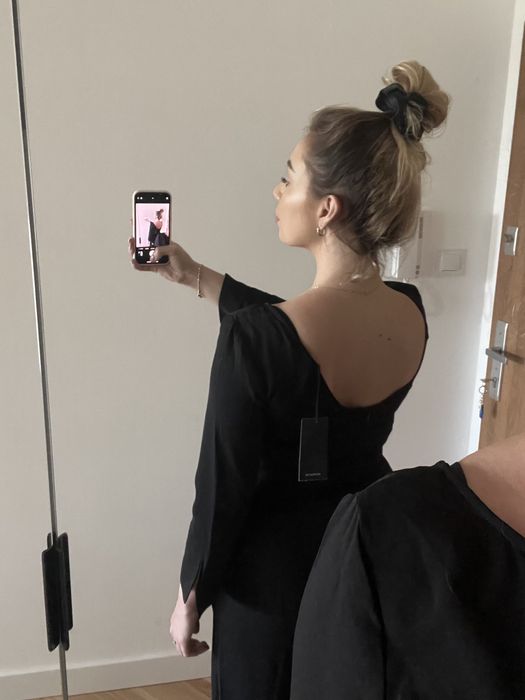 Czarny kombinezon reserved