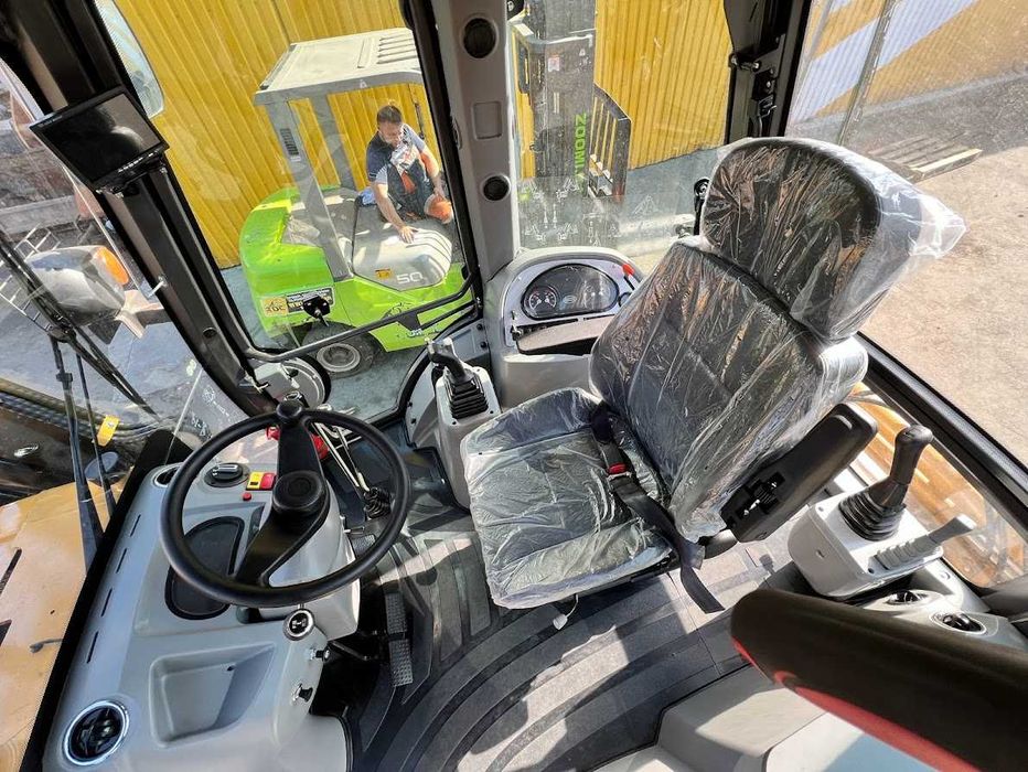 Екскаватор-навантажувач TDC BL105