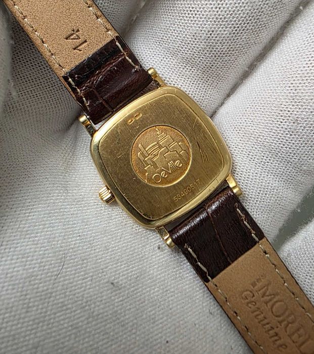 Золотий жіночий годинник Omega De Ville золото 750 пр
