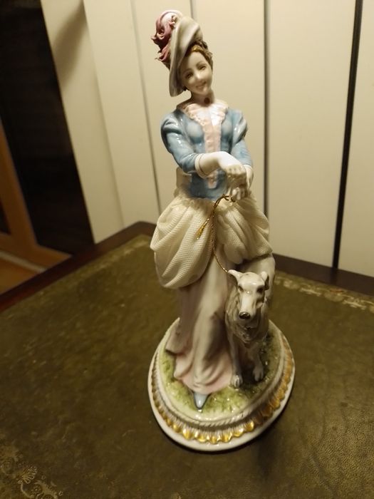 Estatueta em porcelana Tiche