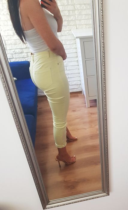 Spodnie rurki żółte cytrynowe obcisłe wysoki stan kieszenie M 38