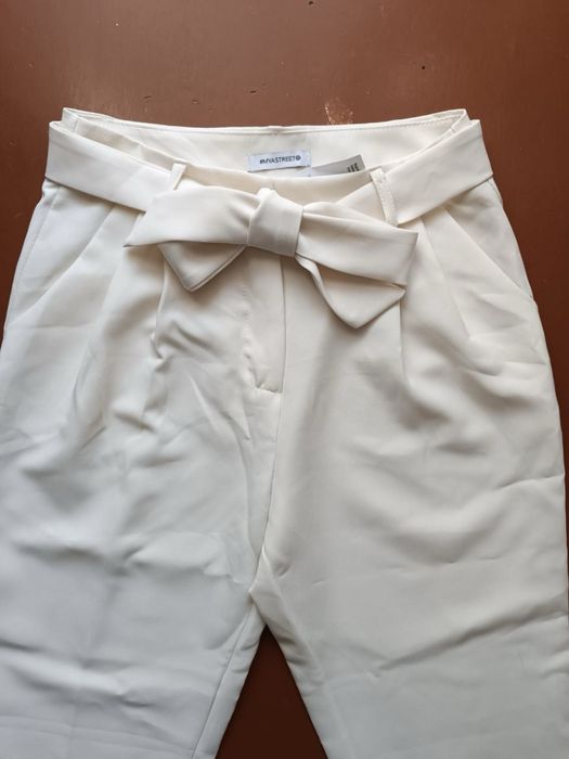 Світлі брюки розмір м 44