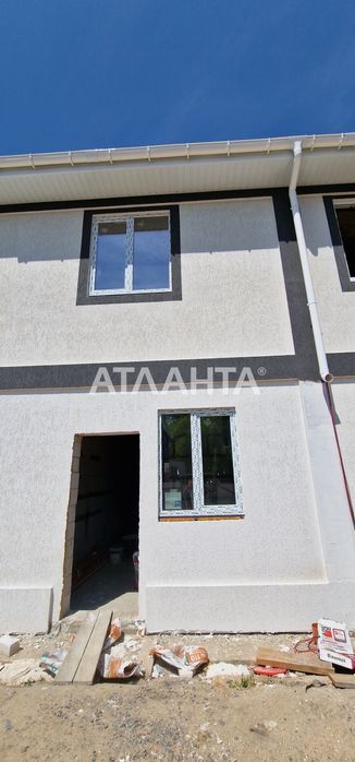 Дворівневий таунхаус в часному секторі