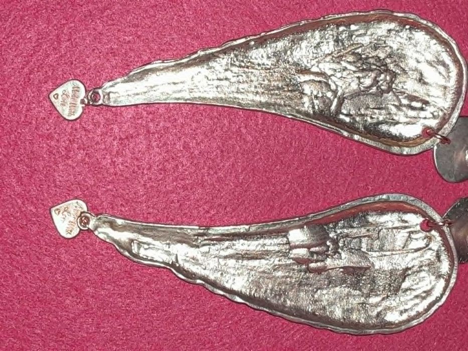 Brincos asas de anjo