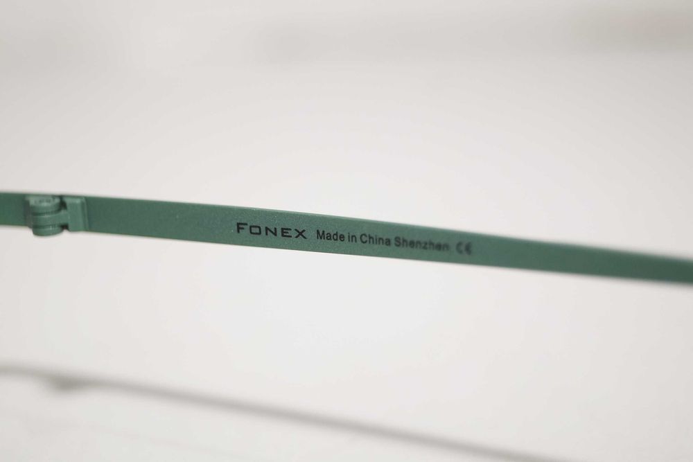 1687 Kolorowe okulary tytanowe oprawki okrągłe do komputera zerówki