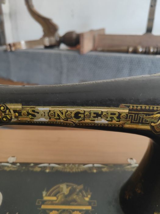 Máquina de costura singer