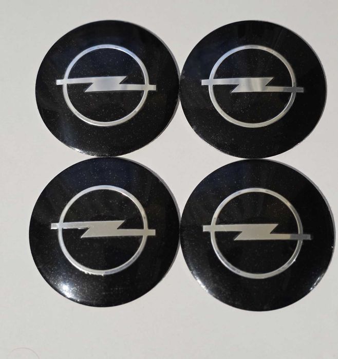 Naklejki aluminiowe na felgi dekielki logo emblematy OPEL 66mm 4szt.