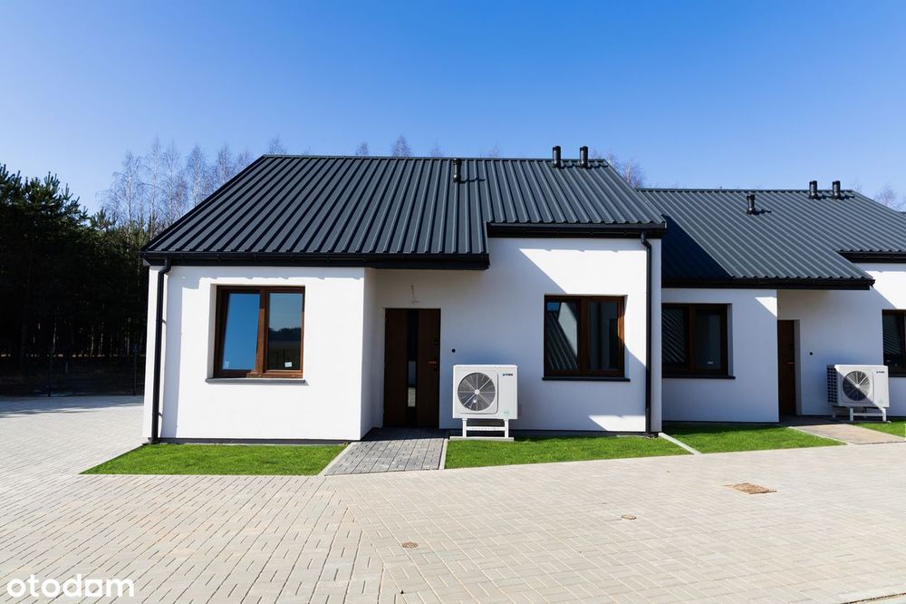 Dom szeregowy w surowym stanie z działką
