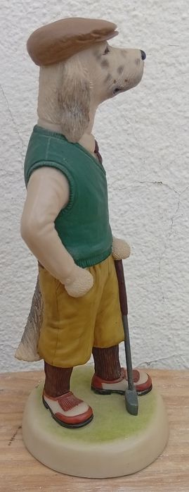 Estatueta de um cão golfista