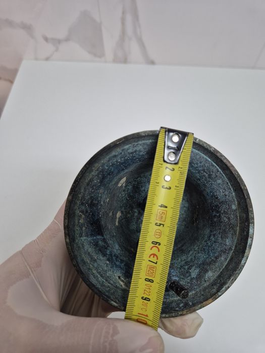 Sino antigo em latão