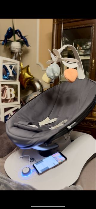 Заколисуючий центр 4moms