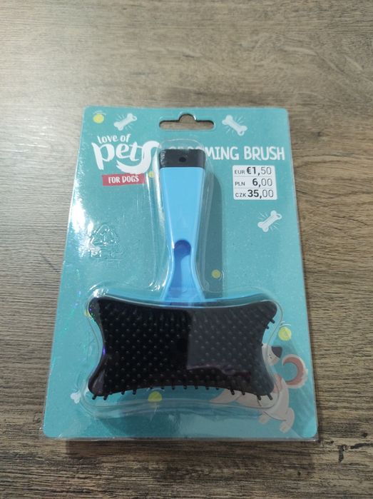 Щетка пуходерка для шерсти кошек и собак с функцией самоочищения.