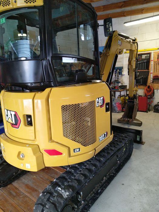 Minikoparka caterpillar 302.7 + wiertnica