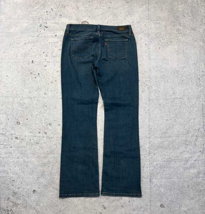 Ciemne granatowe jeansy bootcut flared Levi’s 545 Low Boot Cut