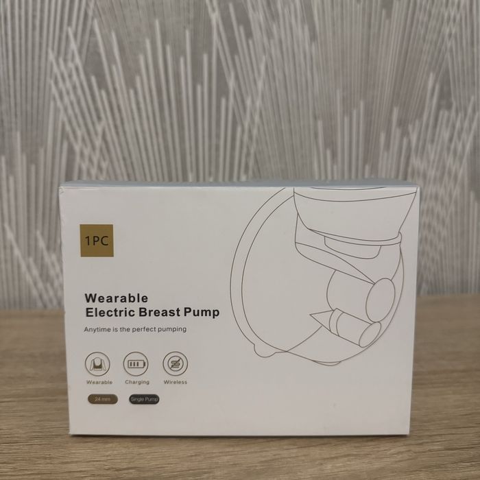 Портативний електричний молоковідсмоктувач